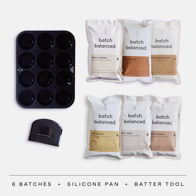 Batch balanced food packages with a silicone pan and batter tool on a white background